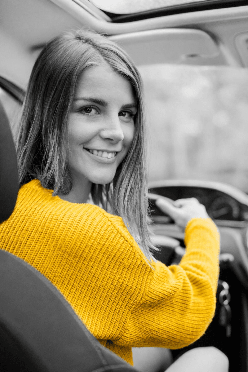 Customer enjoying a clean economy car for rent in Dubai | Goldenlease